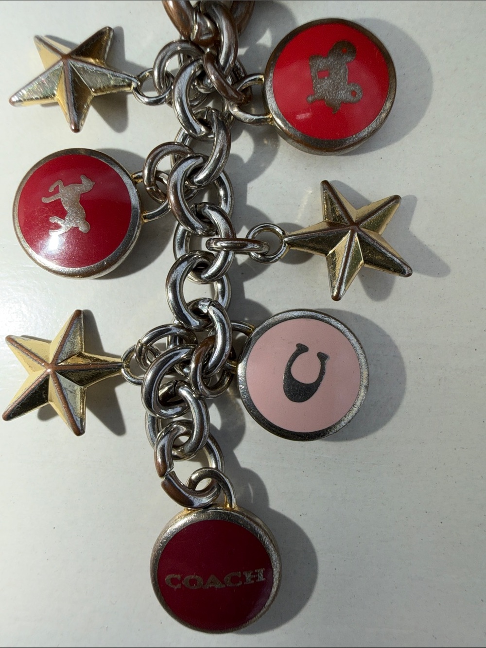 Coach key chain or bag charm w/stars and enamel red and pink charms